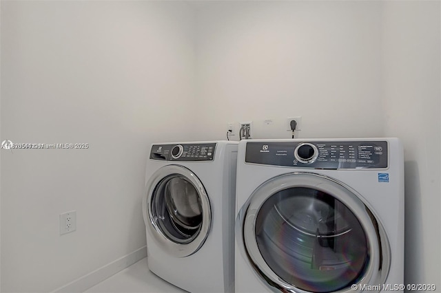 851 NE 1st Ave Unit 1608, Miami, FL 33132 - laundry area with separate washer and dryer