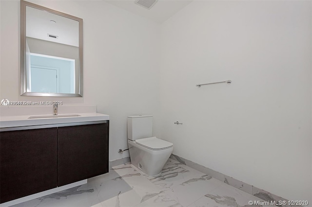 851 NE 1st Ave Unit 1608, Miami, FL 33132 - half bathroom featuring marble look tiles and vanity