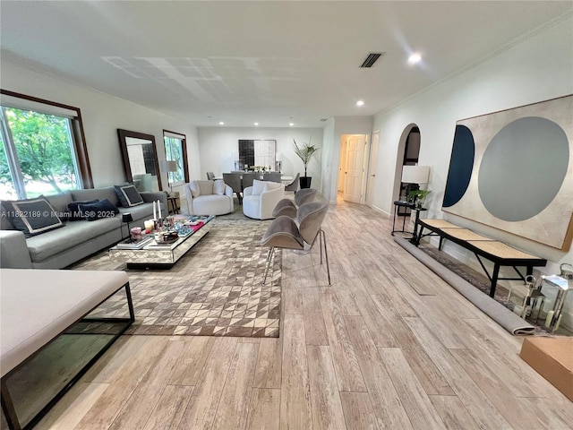 13200 SW 59th Ave, Pinecrest, FL 33156 - living room featuring wood finished floors, plenty of natural light, arched walkways, recessed lighting, and ornamental molding