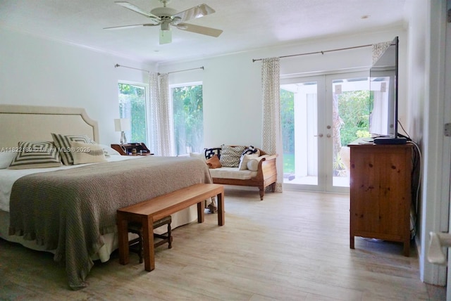 13200 SW 59th Ave, Pinecrest, FL 33156 - bedroom featuring access to outside, light wood finished floors, multiple windows, french doors, and ornamental molding