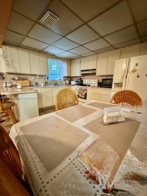 2671 SW 107th Ave, Miami, FL 33165 - dining area with a paneled ceiling