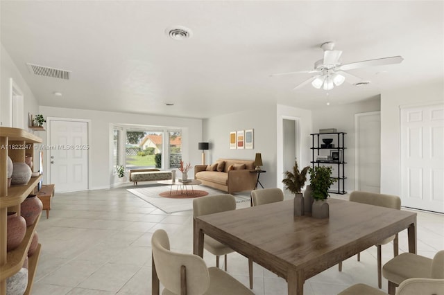1700 SW 5th Ave, Pompano Beach, FL 33060 - dining room with light tile patterned floors and a ceiling fan