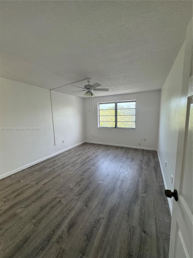 1225 NE 124th St Unit 46A, North Miami, FL 33161 - empty room featuring dark wood-style floors, a textured ceiling, and a ceiling fan