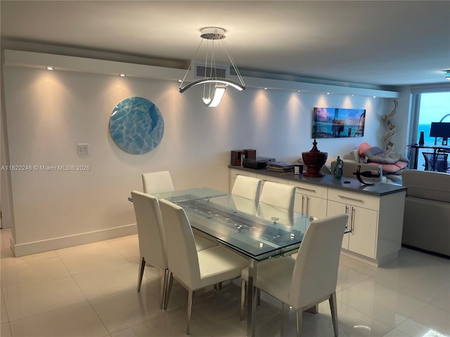 6039 Collins Ave Unit 1525, Miami Beach, FL 33140 - dining area with light tile patterned floors