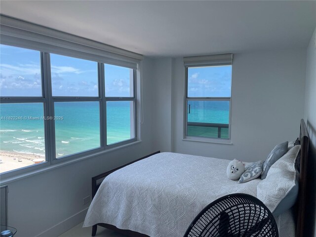 6039 Collins Ave Unit 1525, Miami Beach, FL 33140 - bedroom featuring a water view