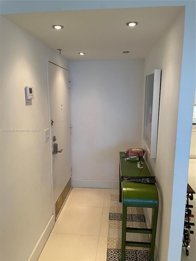 6039 Collins Ave Unit 1525, Miami Beach, FL 33140 - hall featuring recessed lighting and light tile patterned floors