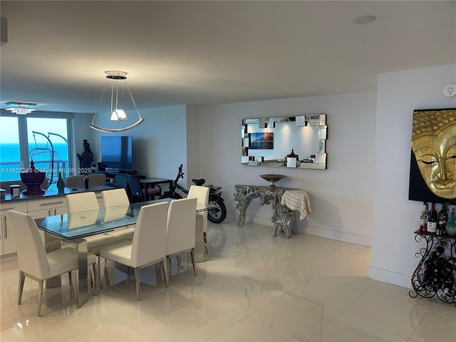 6039 Collins Ave Unit 1525, Miami Beach, FL 33140 - dining space with baseboards