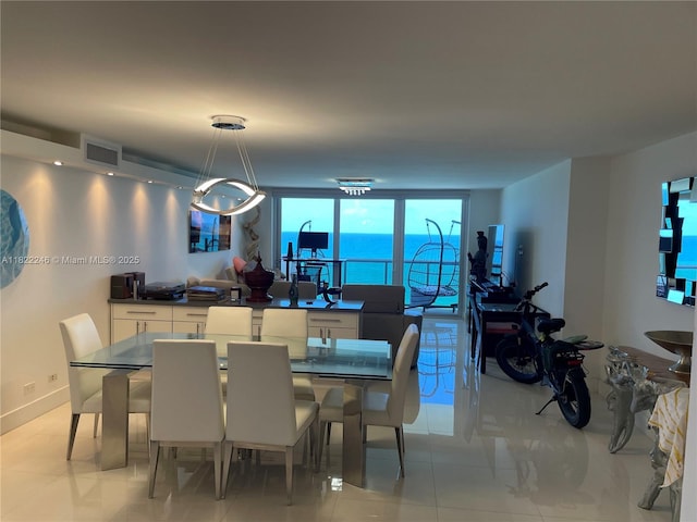 6039 Collins Ave Unit 1525, Miami Beach, FL 33140 - dining space with light tile patterned flooring