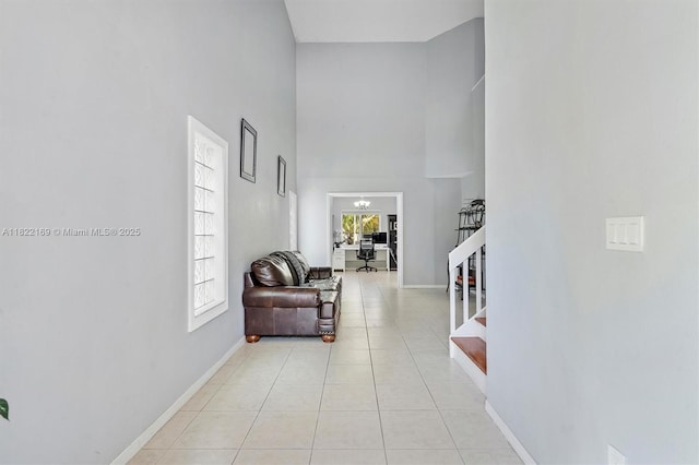 19257 NW 14th St, Pembroke Pines, FL 33029 - hallway with a towering ceiling, stairway, and light tile patterned flooring