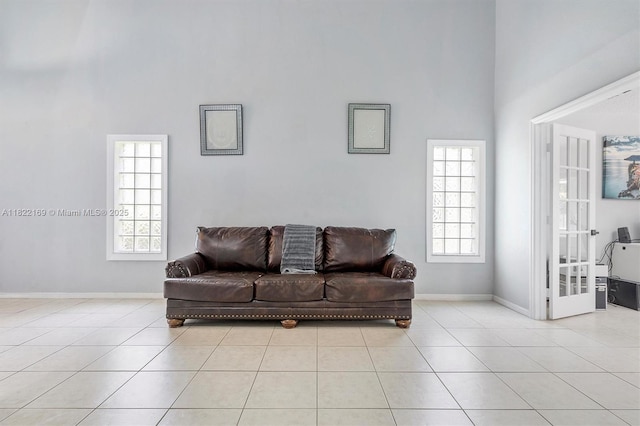 19257 NW 14th St, Pembroke Pines, FL 33029 - living room featuring a high ceiling, plenty of natural light, and tile patterned flooring