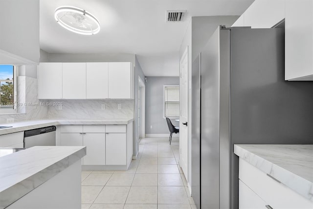 19257 NW 14th St, Pembroke Pines, FL 33029 - kitchen featuring stainless steel appliances, decorative backsplash, white cabinetry, light tile patterned floors, and light stone counters