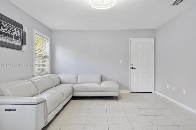 19257 NW 14th St, Pembroke Pines, FL 33029 - living room featuring light tile patterned floors and baseboards