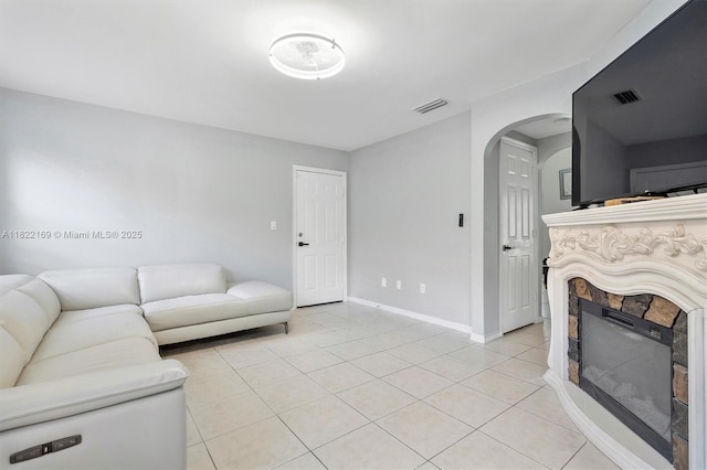 19257 NW 14th St, Pembroke Pines, FL 33029 - living room with arched walkways and light tile patterned floors