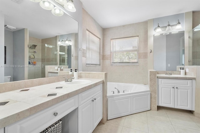 19257 NW 14th St, Pembroke Pines, FL 33029 - full bathroom with two vanities, tile patterned floors, a bath, and a shower stall