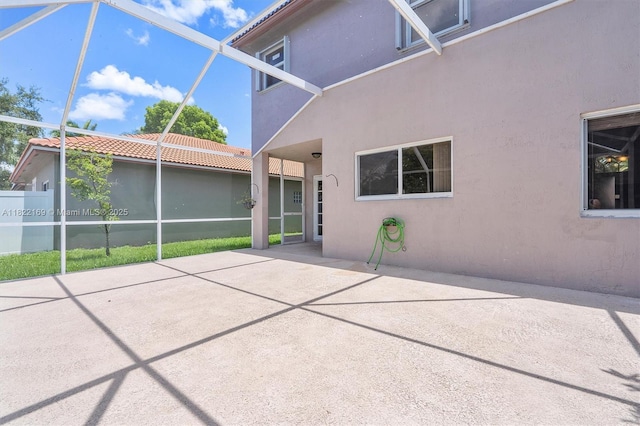 19257 NW 14th St, Pembroke Pines, FL 33029 - back of house with stucco siding, a patio, and a lanai