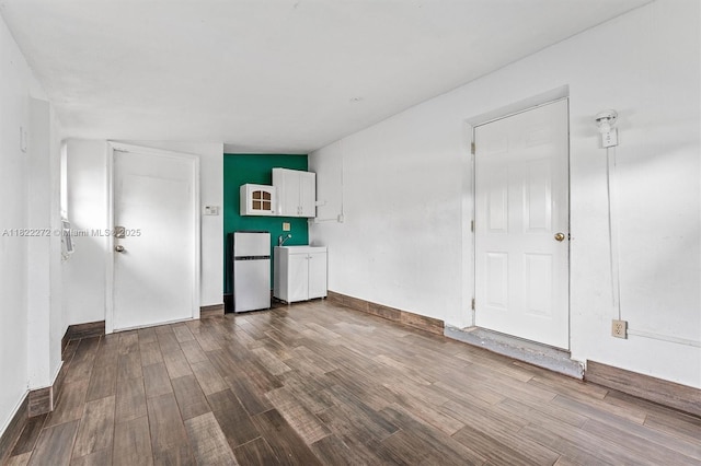 6073 NW 27th St, Margate, FL 33063 - unfurnished room featuring dark wood-type flooring and baseboards