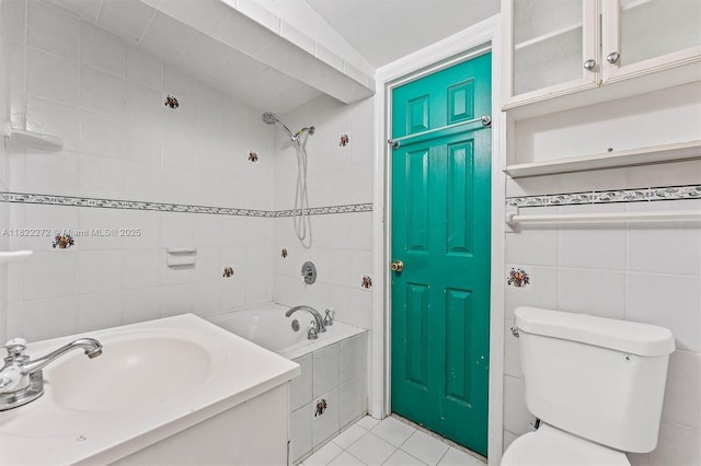 6073 NW 27th St, Margate, FL 33063 - bathroom featuring tile walls, tiled shower / bath, tile patterned flooring, and vanity