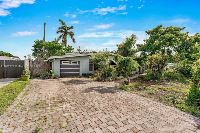 6073 NW 27th St, Margate, FL 33063 - garage featuring a gate