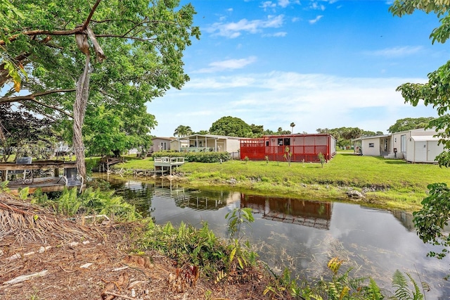 6073 NW 27th St, Margate, FL 33063 - view of grassy yard with a water view