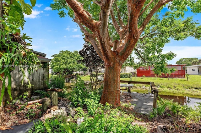 6073 NW 27th St, Margate, FL 33063 - view of green lawn with a deck