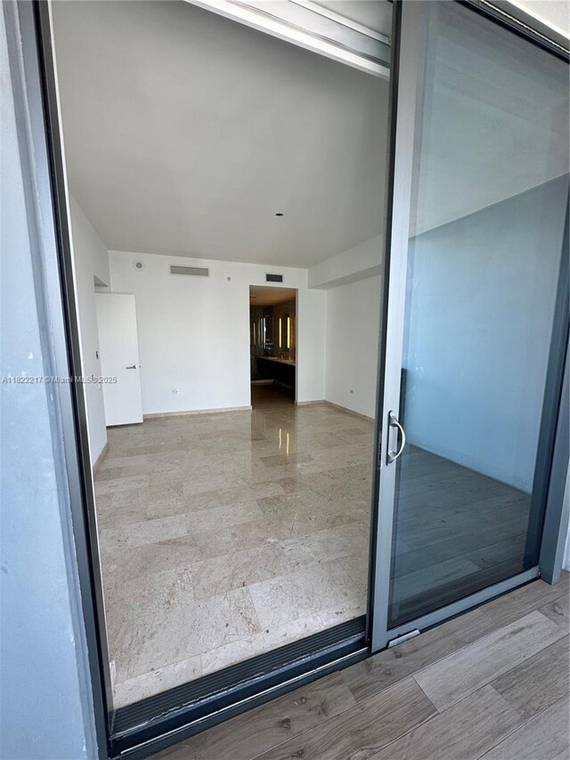 88 SW 7th St Unit 3012, Miami, FL 33130 - unfurnished room with baseboards