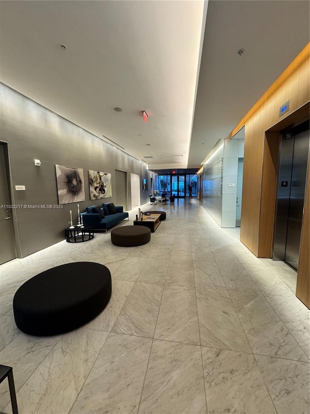 88 SW 7th St Unit 3012, Miami, FL 33130 - building lobby featuring wood walls