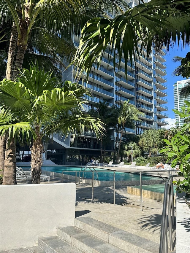 88 SW 7th St Unit 3012, Miami, FL 33130 - community pool featuring a patio
