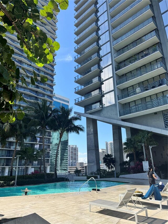 88 SW 7th St Unit 3012, Miami, FL 33130 - community pool with a city view