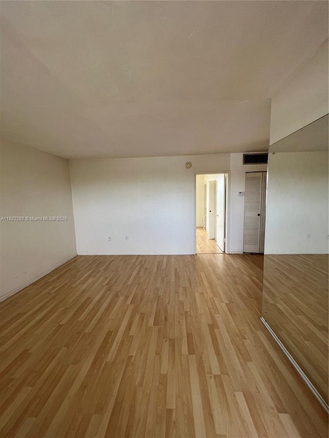 1475 NE 125th Ter Unit 511B, North Miami, FL 33161 - spare room with light wood finished floors