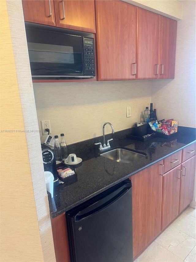 18001 Collins Ave Unit 918, Sunny Isles Beach, FL 33160 - kitchen with dishwasher, black microwave, and dark stone countertops