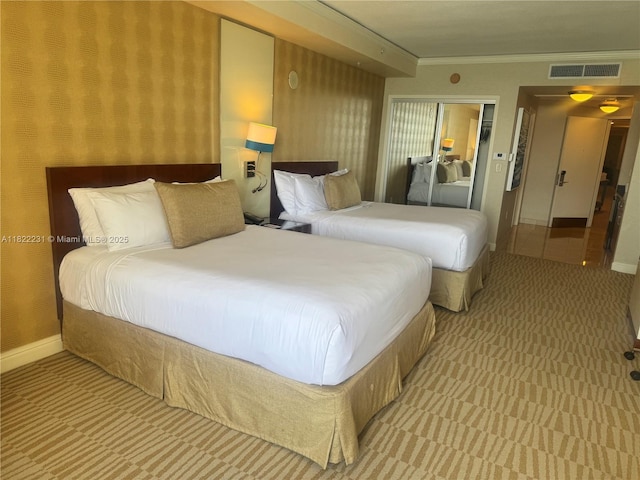 18001 Collins Ave Unit 918, Sunny Isles Beach, FL 33160 - bedroom featuring carpet flooring, crown molding, and a closet