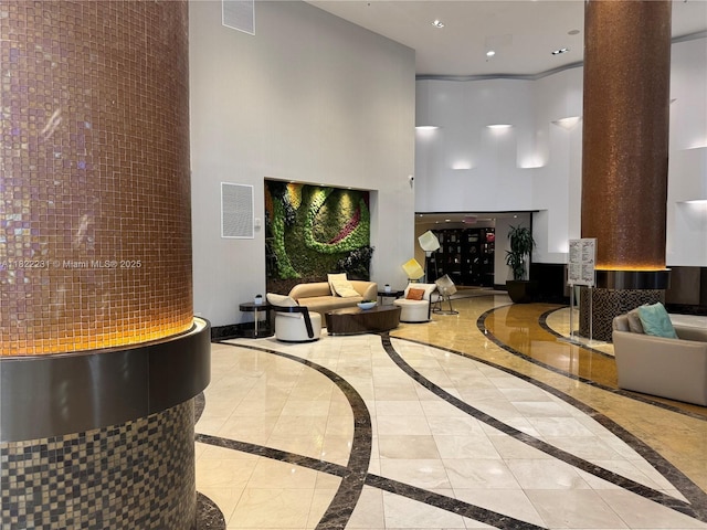 18001 Collins Ave Unit 918, Sunny Isles Beach, FL 33160 - building lobby with a towering ceiling and recessed lighting