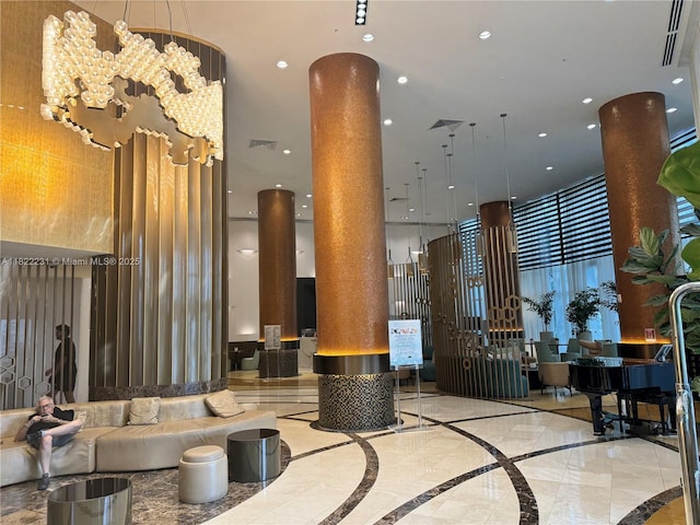 18001 Collins Ave Unit 918, Sunny Isles Beach, FL 33160 - community lobby with a high ceiling and recessed lighting