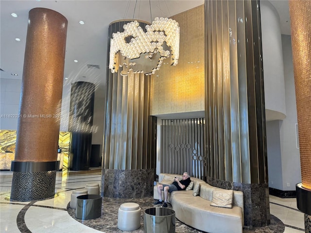 18001 Collins Ave Unit 918, Sunny Isles Beach, FL 33160 - building lobby with a high ceiling and recessed lighting
