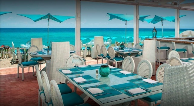 18001 Collins Ave Unit 918, Sunny Isles Beach, FL 33160 - dining area featuring a water view and brick floors