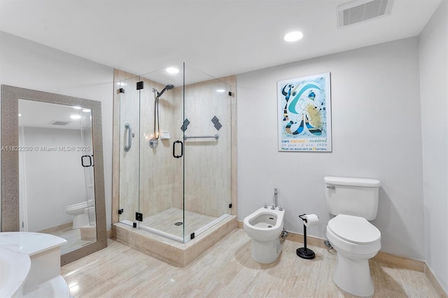 7225 Promenade Dr Unit 102, Boca Raton, FL 33433 - bathroom with a bidet, a shower stall, wood finished floors, and recessed lighting
