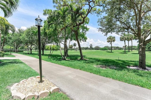 7225 Promenade Dr Unit 102, Boca Raton, FL 33433 - view of home's community with a yard