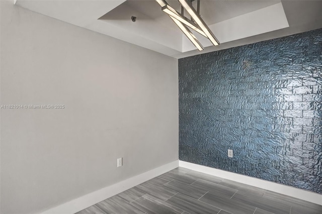 1200 Brickell Bay Dr Unit 2501, Miami, FL 33131 - spare room featuring baseboards