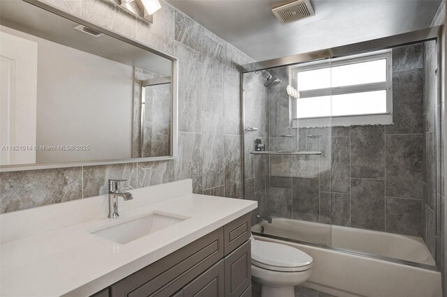 1200 Brickell Bay Dr Unit 2501, Miami, FL 33131 - full bath featuring vanity and bath / shower combo with glass door