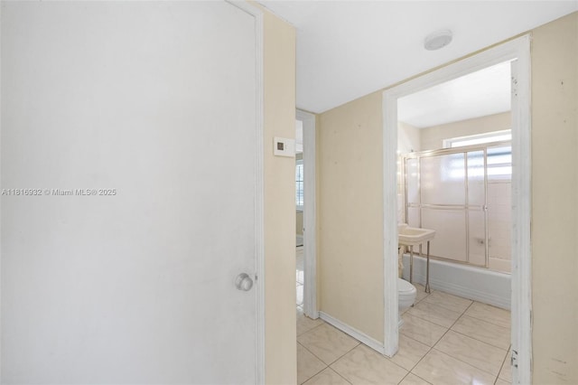 9920 Collins Ave Unit 2, Bal Harbour, FL 33154 - corridor with light tile patterned flooring