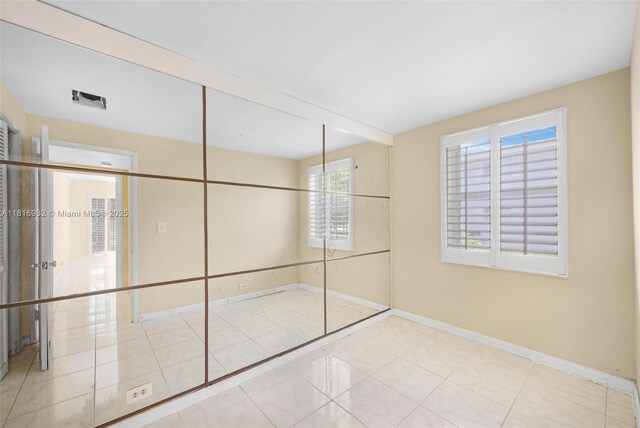9920 Collins Ave Unit 2, Bal Harbour, FL 33154 - empty room with baseboards