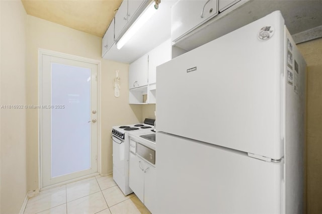 9920 Collins Ave Unit 2, Bal Harbour, FL 33154 - kitchen featuring white appliances, white cabinetry, light tile patterned floors, and light countertops