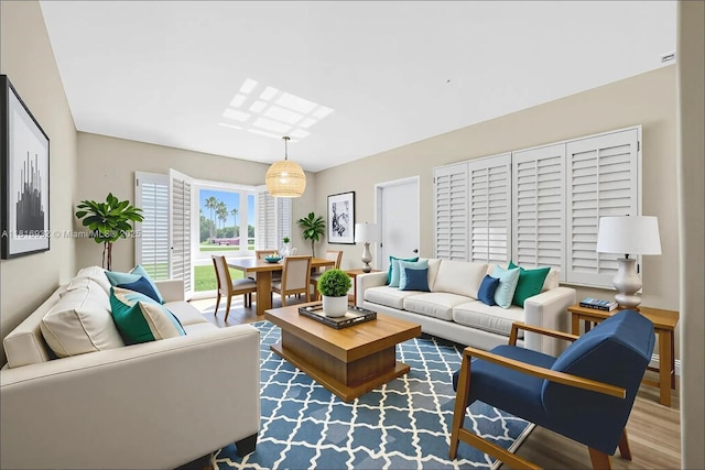 9920 Collins Ave Unit 2, Bal Harbour, FL 33154 - living area featuring wood finished floors
