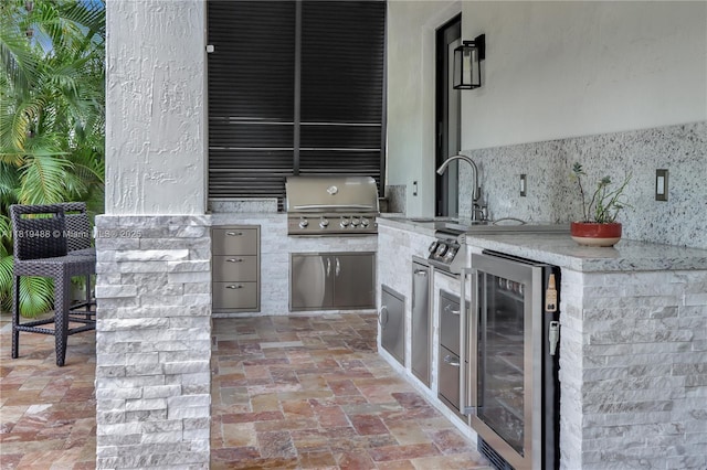 8902 NW 178th Ln, Hialeah, FL 33018 - view of patio / terrace featuring beverage cooler and exterior kitchen