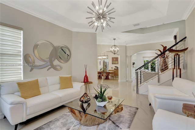 8902 NW 178th Ln, Hialeah, FL 33018 - living area featuring a chandelier, arched walkways, ornamental molding, stairs, and decorative columns