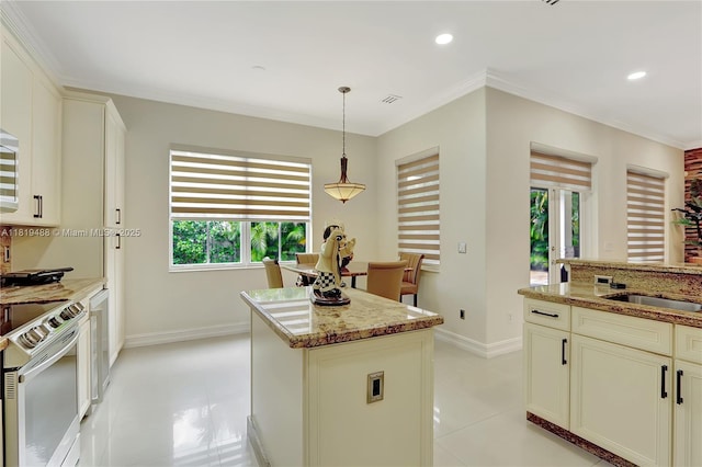 8902 NW 178th Ln, Hialeah, FL 33018 - kitchen featuring white range, a center island, hanging light fixtures, light stone countertops, and recessed lighting