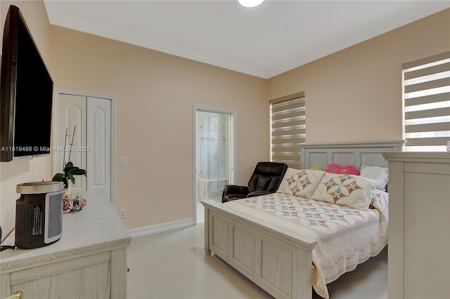 8902 NW 178th Ln, Hialeah, FL 33018 - bedroom with light tile patterned flooring and baseboards