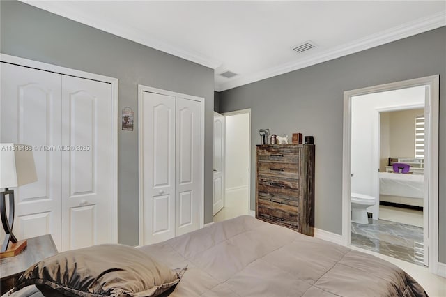 8902 NW 178th Ln, Hialeah, FL 33018 - bedroom with two closets, crown molding, ensuite bathroom, and marble finish floors