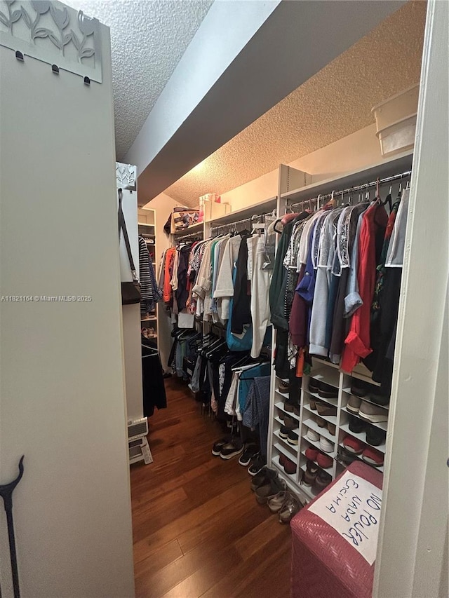 13205 SW 119th St, Miami, FL 33186 - walk in closet featuring wood-type flooring