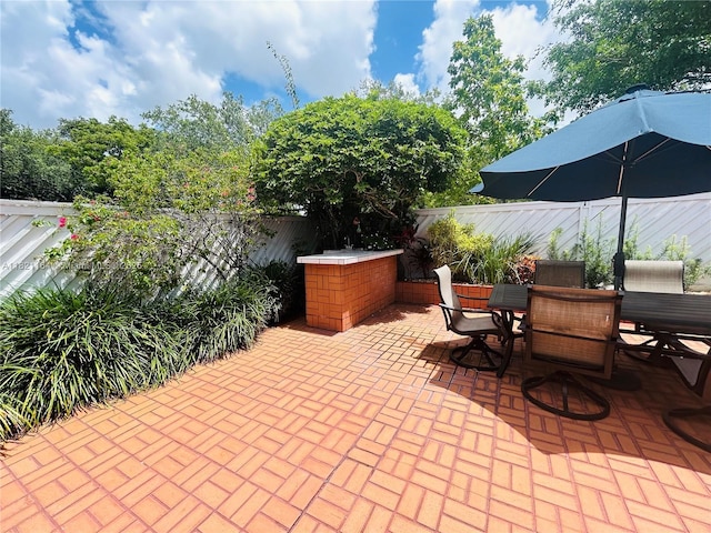 13205 SW 119th St, Miami, FL 33186 - view of patio / terrace with outdoor dining area